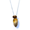 BRASS SILK COCOON LOCKET / SILVER CHAIN